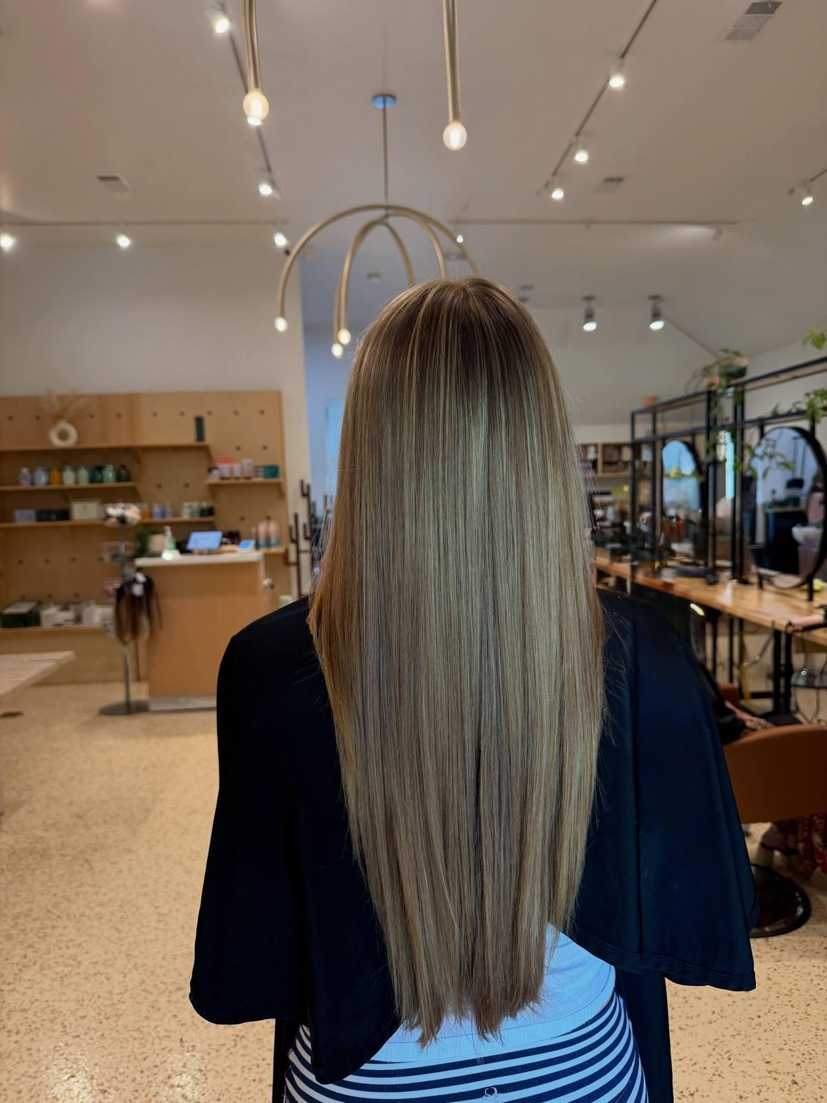 Long cool-toned blonde, blown out straight