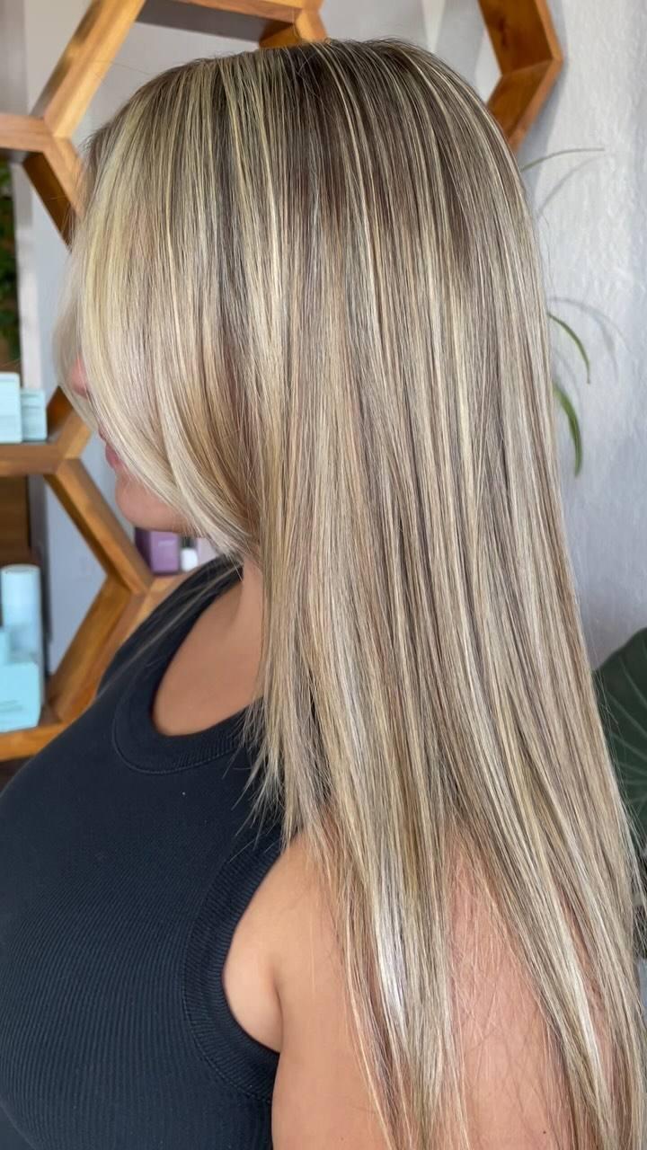 Long icy blonde with a soft shadow root