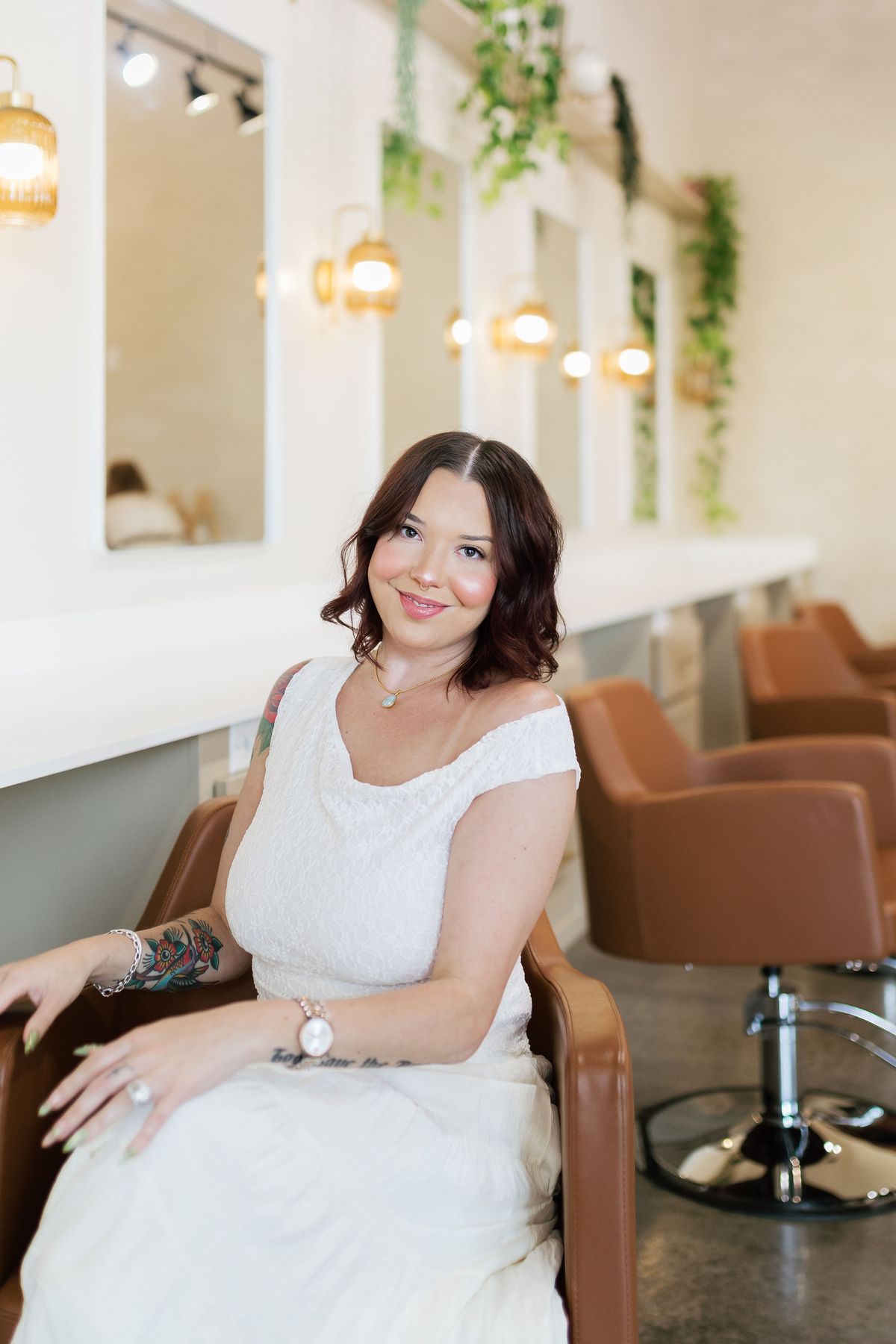Mya Binder, Fort Worth hair stylist, at her chair inside South Main District Salon